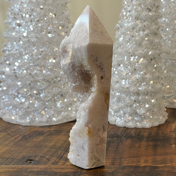 Pink Amethyst druzy tower, showcasing delicate crystalline formations in a soothing hue for a truly enchanting natural beauty.
