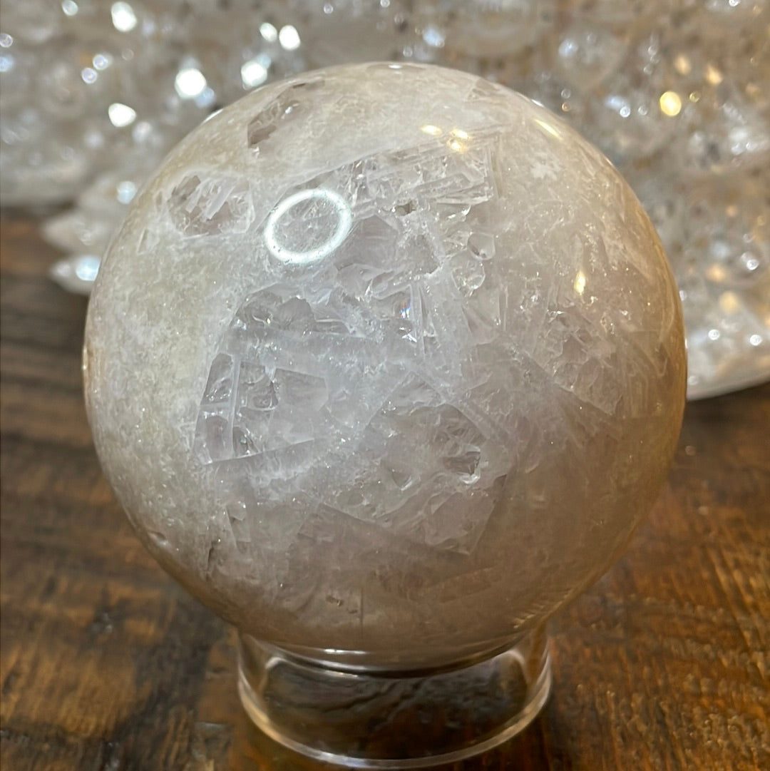 Pink Amethyst Druzy Sphere, a radiant and enchanting crystal ball showcasing delicate crystalline formations in soothing pink tones.