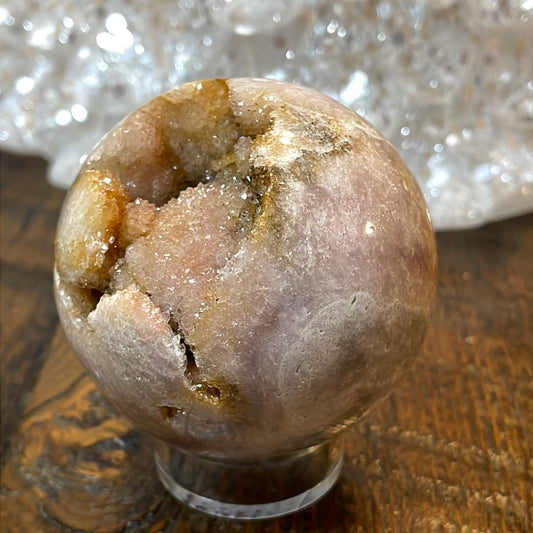 Pink Amethyst Druzy Sphere, a radiant and enchanting crystal ball showcasing delicate crystalline formations in soothing pink tones.