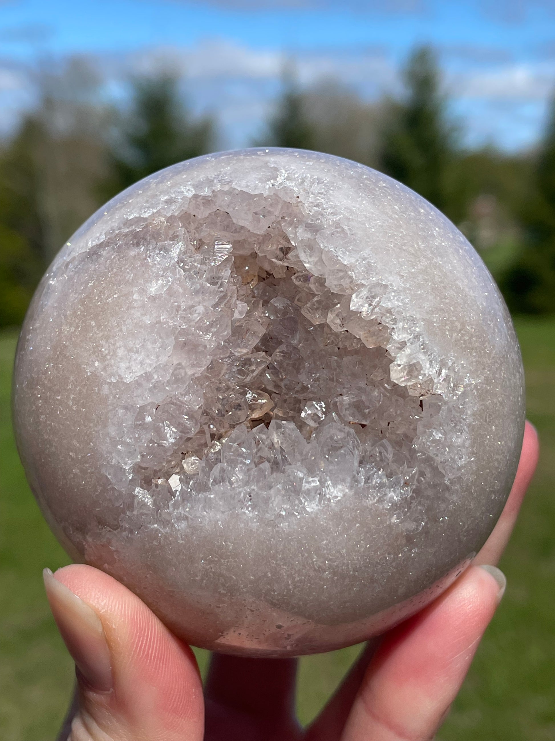 Pink Amethyst Sphere: Radiant crystal ball with delicate pink tones