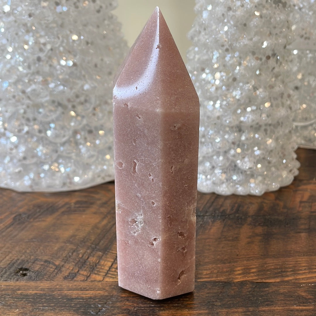 Pink Amethyst druzy tower, showcasing delicate crystalline formations in a soothing hue for a truly enchanting natural beauty.