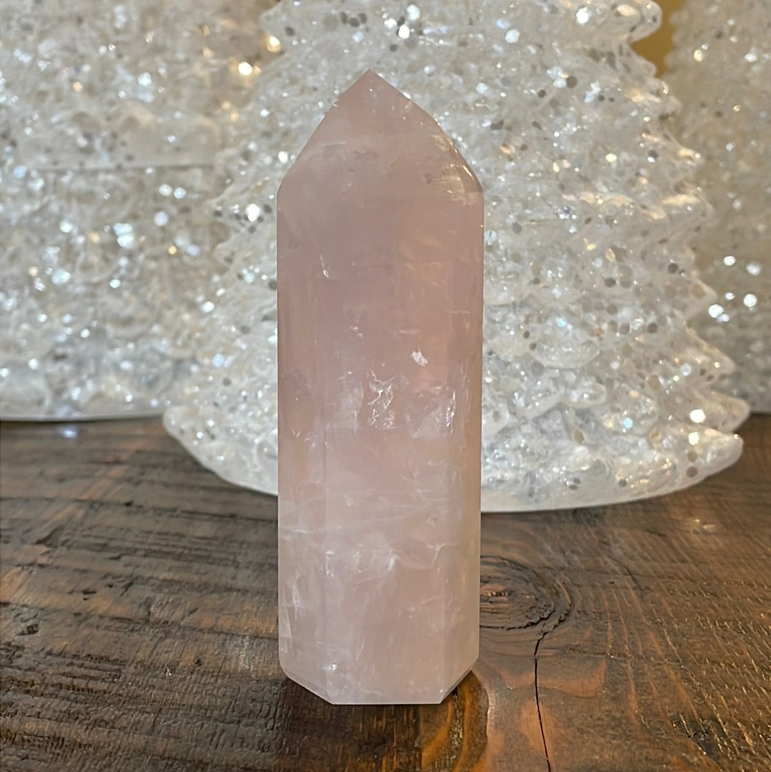 Elegant Rose Quartz tower, featuring soft pink tones and a graceful crystal formation for a serene and enchanting aesthetic