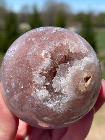 Pink Amethyst Sphere: Radiant crystal ball with delicate pink tones