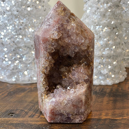 Pink Amethyst druzy tower, showcasing delicate crystalline formations in a soothing hue for a truly enchanting natural beauty.