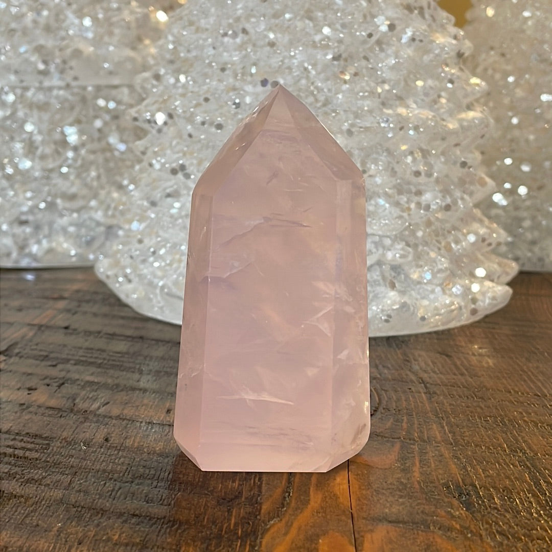 Elegant Rose Quartz tower, featuring soft pink tones and a graceful crystal formation for a serene and enchanting aesthetic