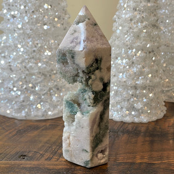Pink Amethyst druzy tower, showcasing delicate crystalline formations in a soothing hue for a truly enchanting natural beauty.