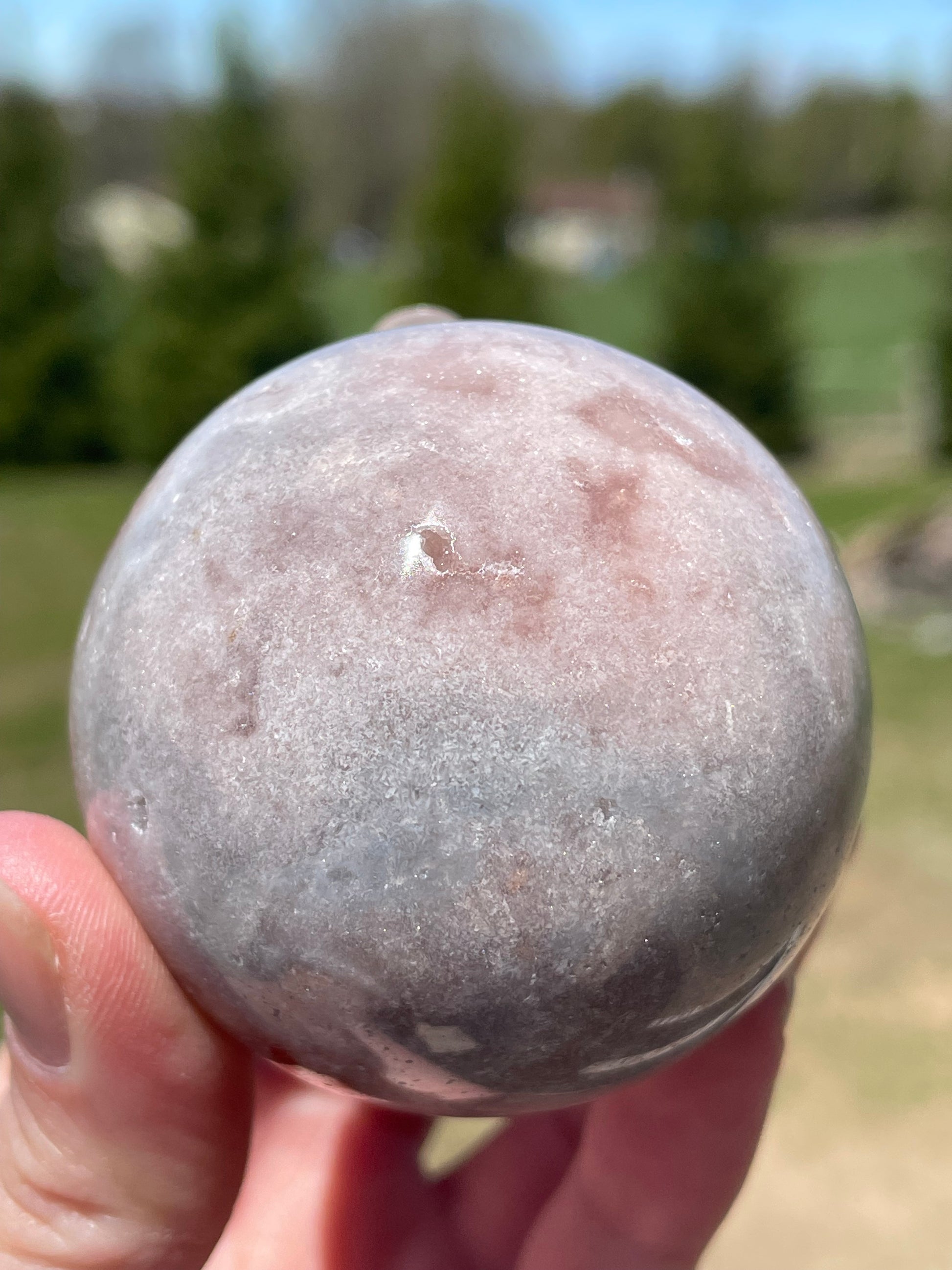 Pink Amethyst Sphere: Radiant crystal ball with delicate pink tones