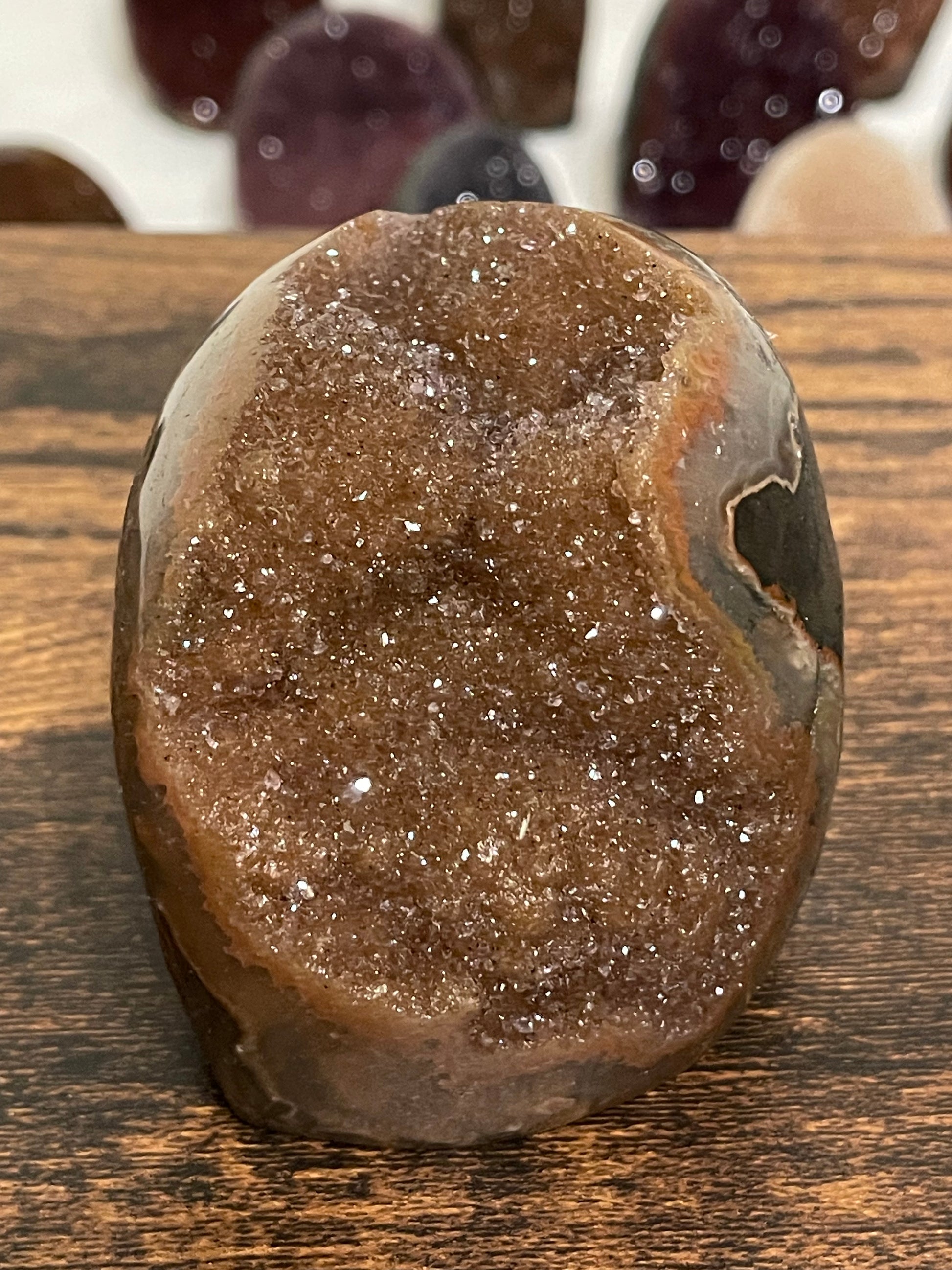 Variations of brown Amethyst with flat base and sugar crystal cut, creating a distinctive and elegant crystal formation