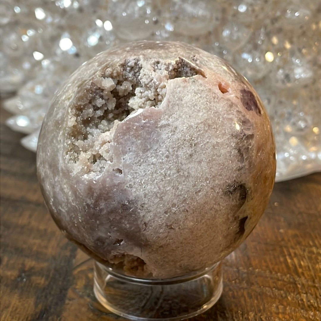 Pink Amethyst Druzy Sphere, a radiant and enchanting crystal ball showcasing delicate crystalline formations in soothing pink tones.