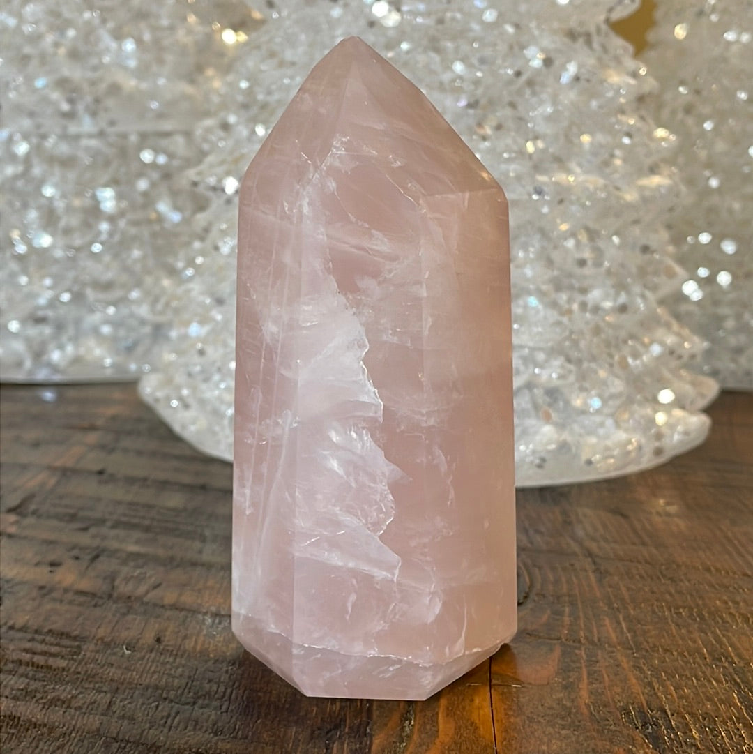 Elegant Rose Quartz tower, featuring soft pink tones and a graceful crystal formation for a serene and enchanting aesthetic