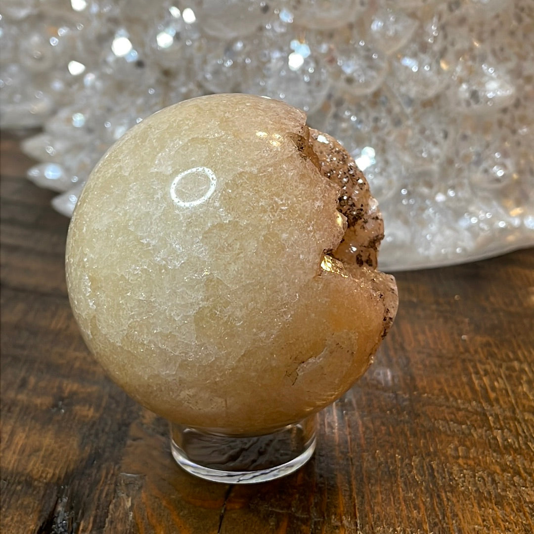 Pink Amethyst Druzy Sphere, a radiant and enchanting crystal ball showcasing delicate crystalline formations in soothing pink tones.