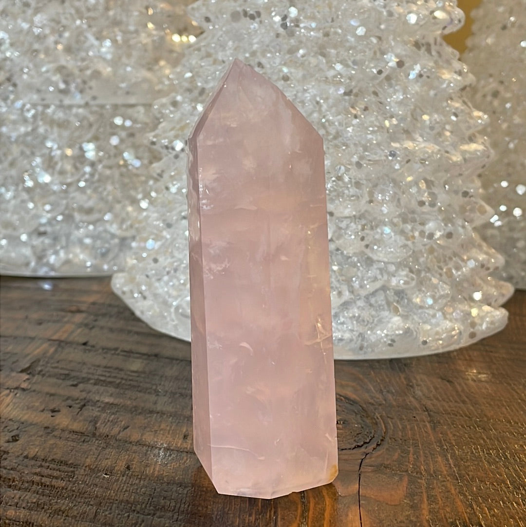 Elegant Rose Quartz tower, featuring soft pink tones and a graceful crystal formation for a serene and enchanting aesthetic