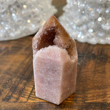 Pink Amethyst druzy tower, showcasing delicate crystalline formations in a soothing hue for a truly enchanting natural beauty.
