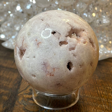 Pink Amethyst Druzy Sphere, a radiant and enchanting crystal ball showcasing delicate crystalline formations in soothing pink tones.