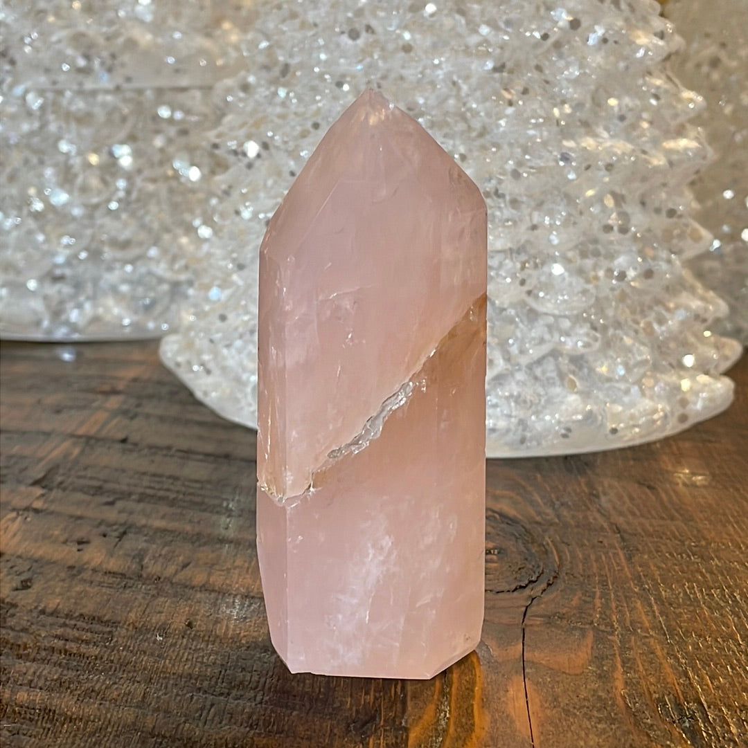 Elegant Rose Quartz tower, featuring soft pink tones with golden healer and a graceful crystal formation for a serene and enchanting aesthetic