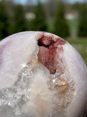 Pink Amethyst Sphere: Radiant crystal ball with delicate pink tones