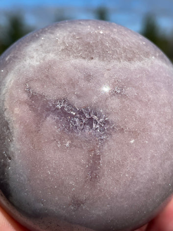 Pink Amethyst Sphere: Radiant crystal ball with delicate pink tones