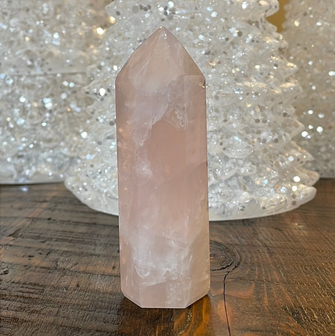Elegant Rose Quartz tower, featuring soft pink tones and a graceful crystal formation for a serene and enchanting aesthetic