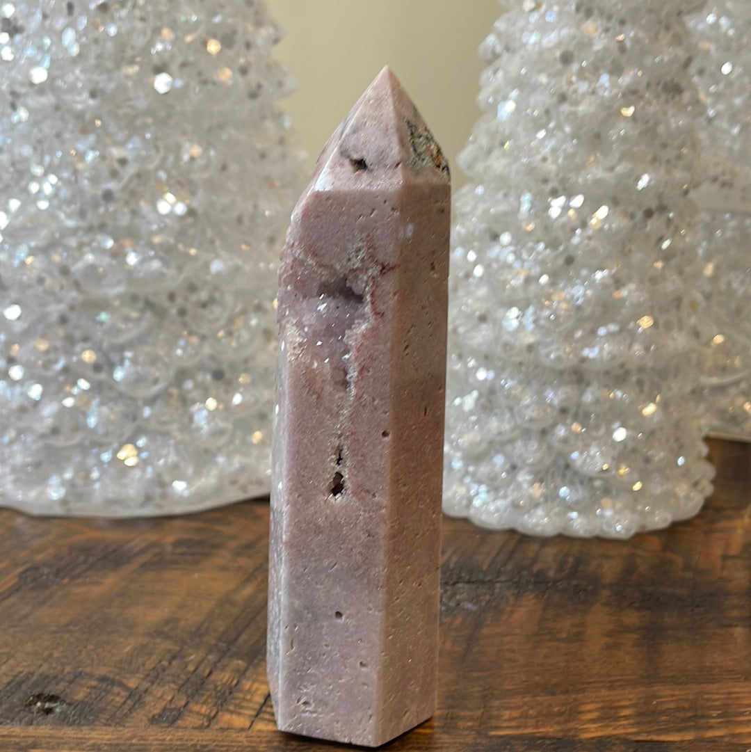 Pink Amethyst druzy tower, showcasing delicate crystalline formations in a soothing hue for a truly enchanting natural beauty.