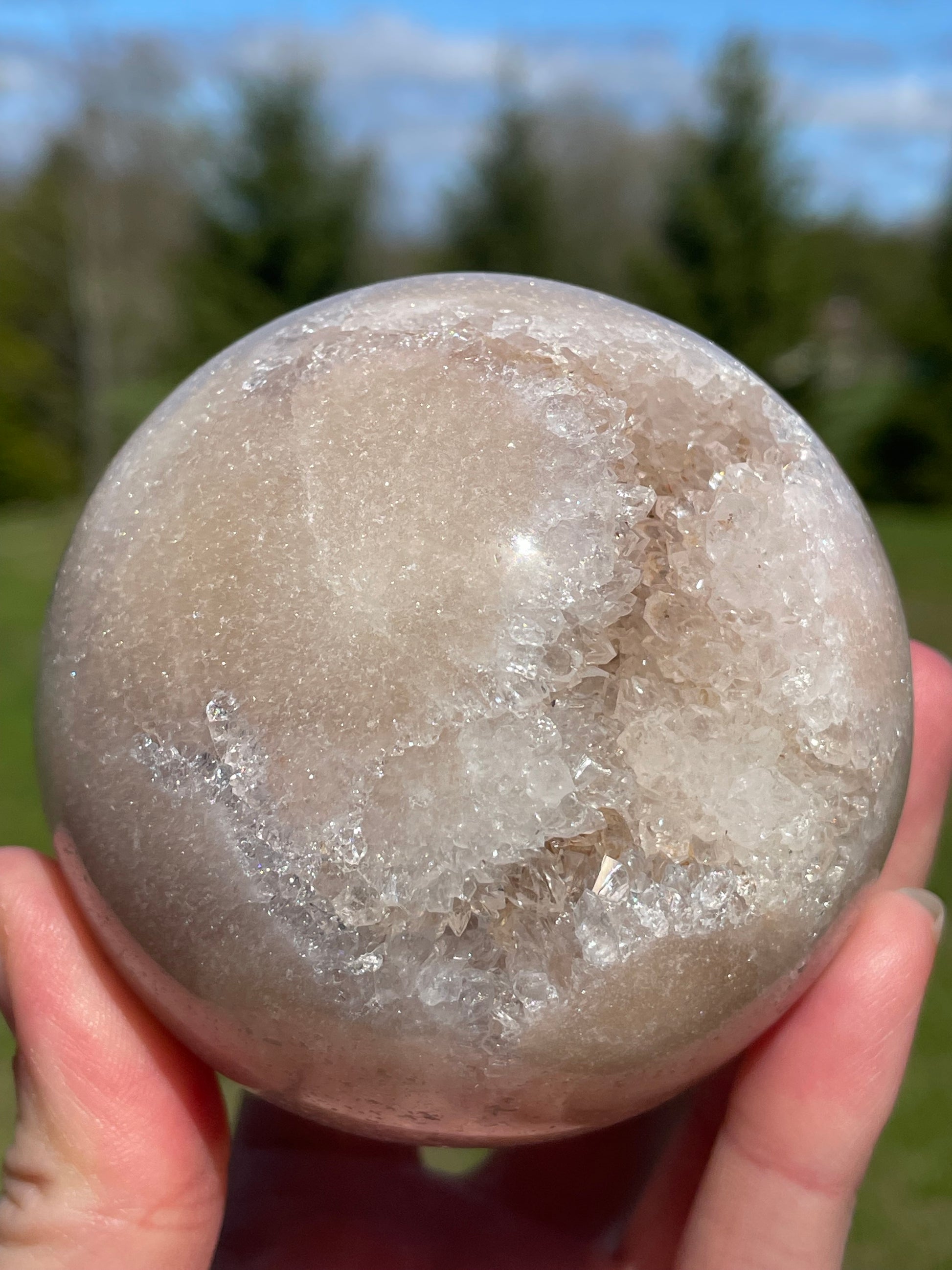 Pink Amethyst Sphere: Radiant crystal ball with delicate pink tones