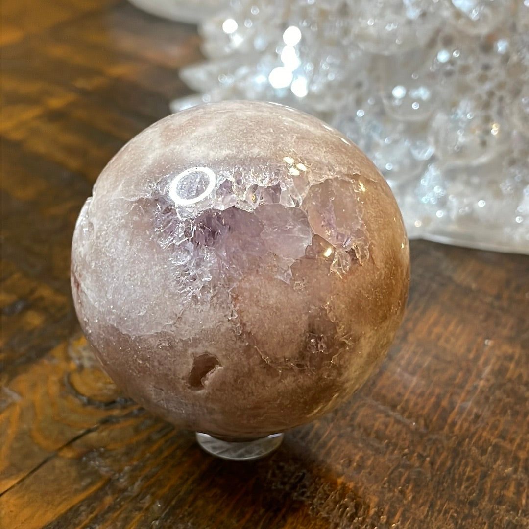 Pink Amethyst Druzy Sphere, a radiant and enchanting crystal ball showcasing delicate crystalline formations in soothing pink tones.