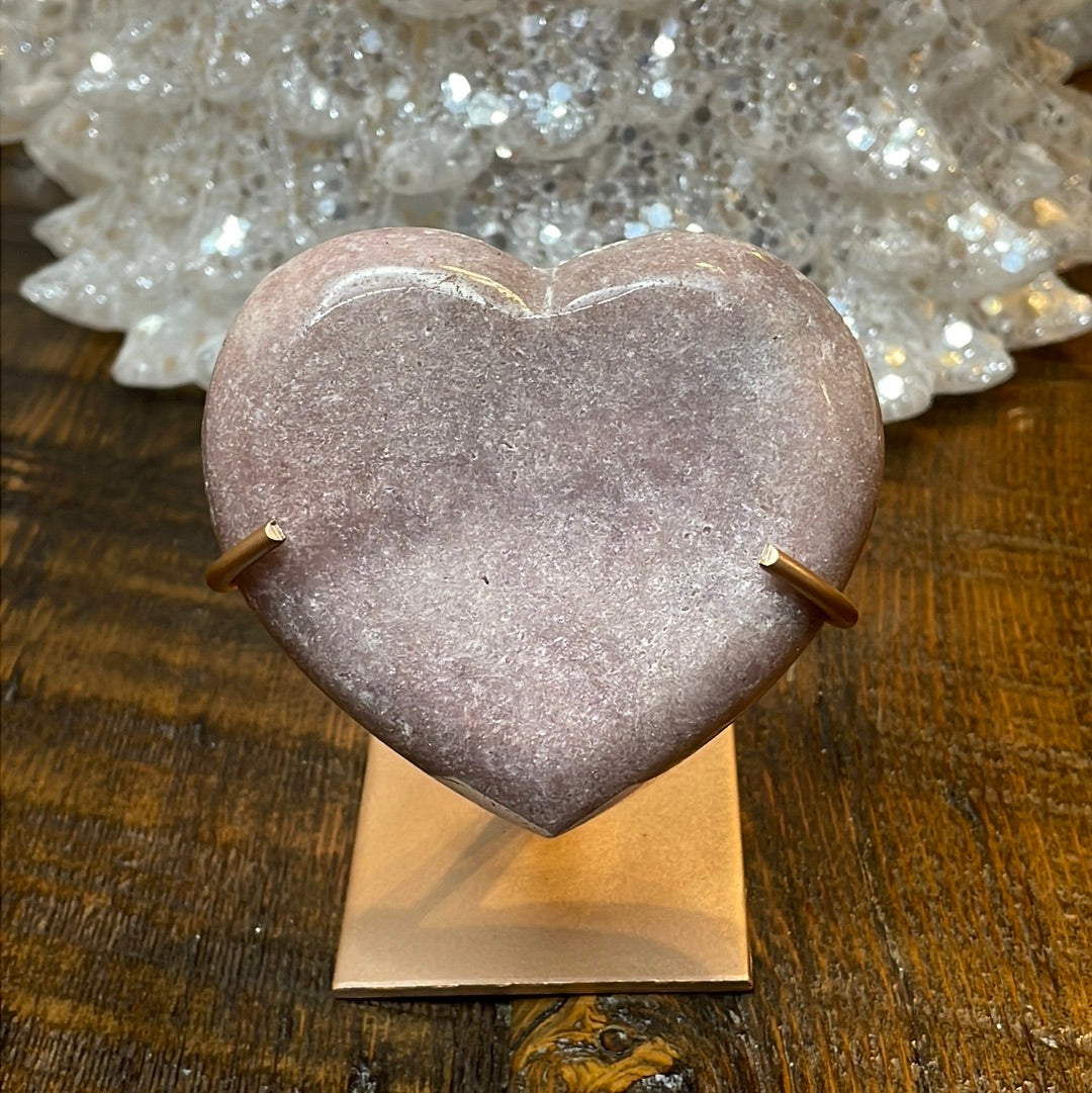 Pink Amethyst druzy hearts elagantly presented on custom metal stands, blending romance and sophistication in a crystalline showcase.