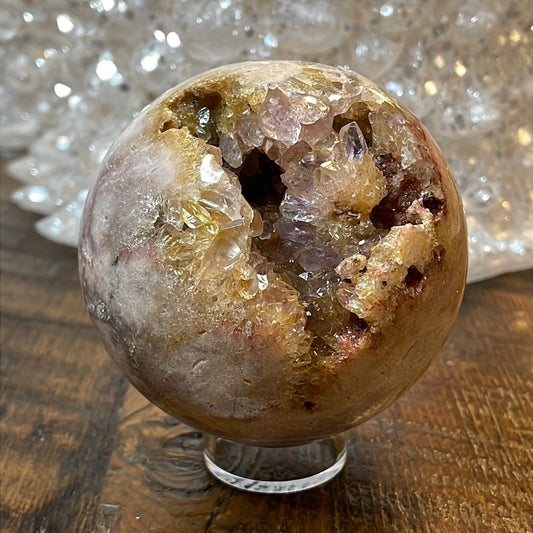Pink Amethyst Druzy Sphere, a radiant and enchanting crystal ball showcasing delicate crystalline formations in soothing pink tones.