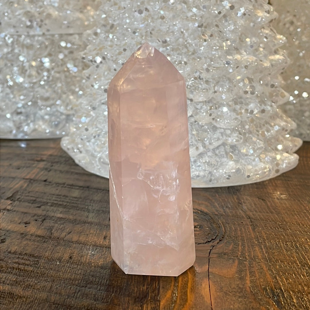 Elegant Rose Quartz tower, featuring soft pink tones and a graceful crystal formation for a serene and enchanting aesthetic