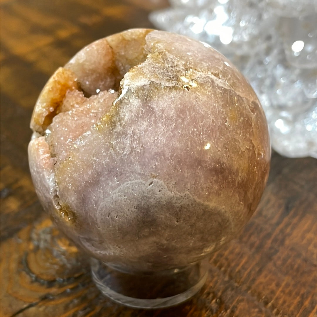 Pink Amethyst Druzy Sphere, a radiant and enchanting crystal ball showcasing delicate crystalline formations in soothing pink tones.