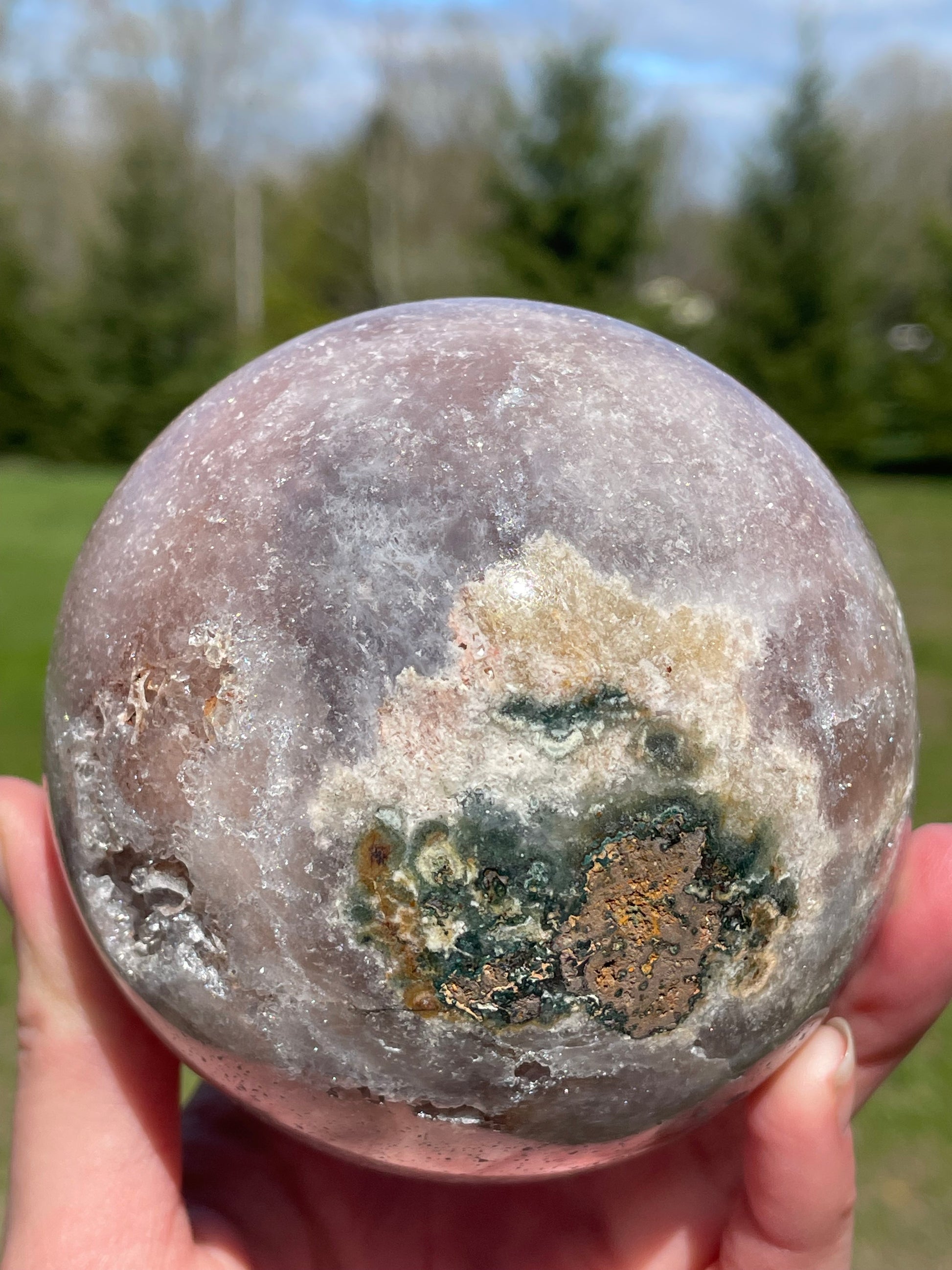 Pink Amethyst Sphere: Radiant crystal ball with delicate pink tones