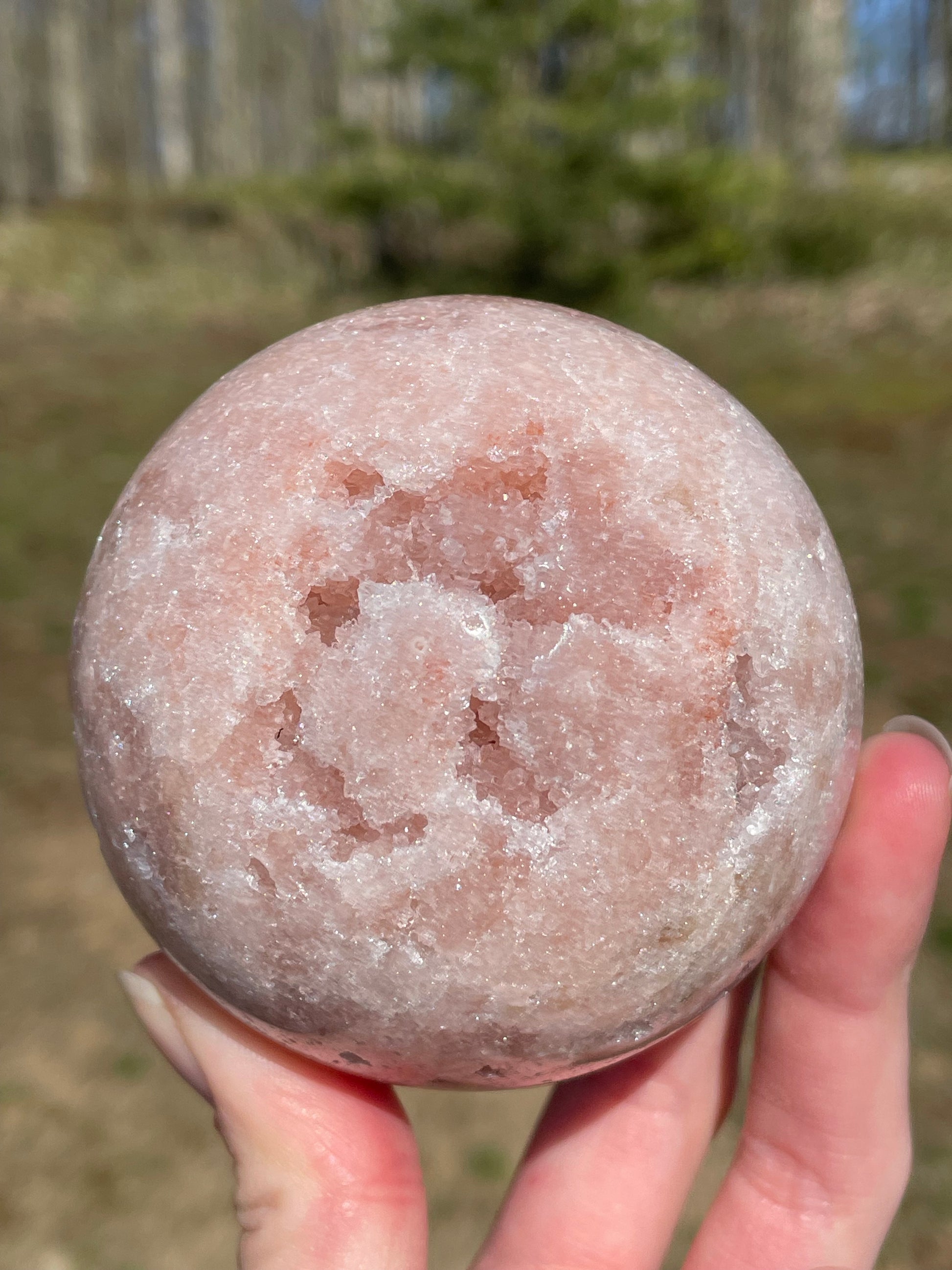 Pink Amethyst Sphere: Radiant crystal ball with delicate pink tones