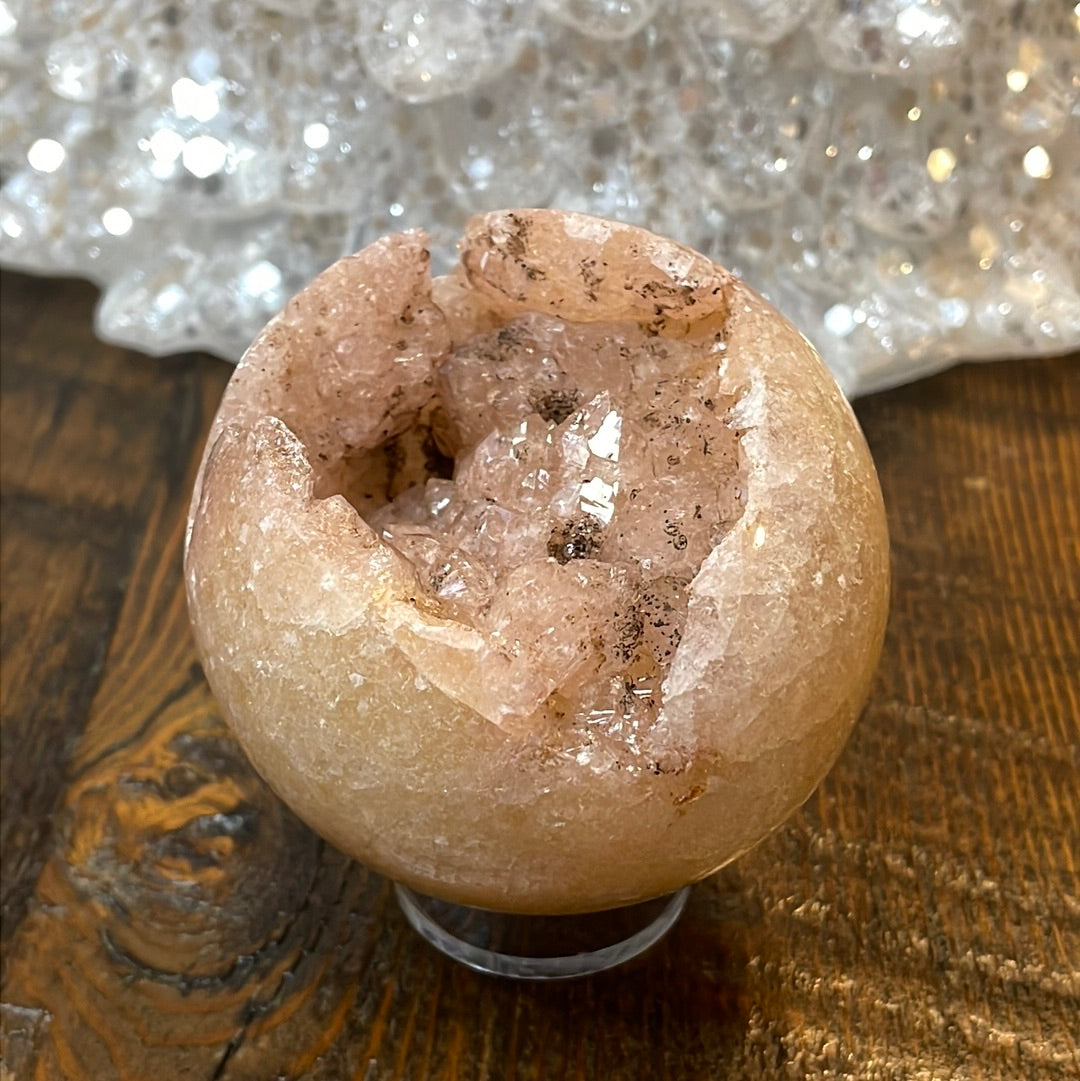 Pink Amethyst Druzy Sphere, a radiant and enchanting crystal ball showcasing delicate crystalline formations in soothing pink tones.