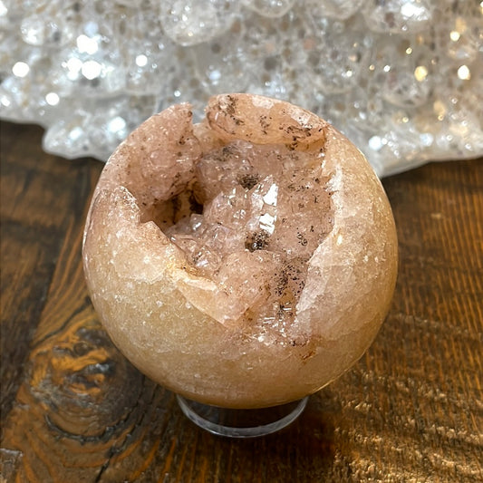Pink Amethyst Druzy Sphere, a radiant and enchanting crystal ball showcasing delicate crystalline formations in soothing pink tones.
