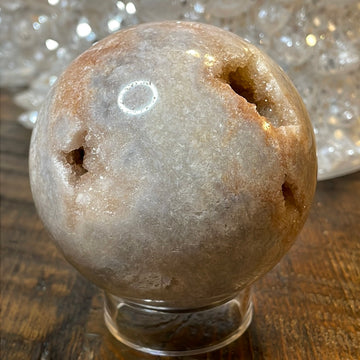 Pink Amethyst Druzy Sphere, a radiant and enchanting crystal ball showcasing delicate crystalline formations in soothing pink tones.