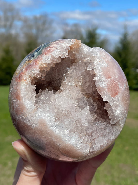 Pink Amethyst Sphere: Radiant crystal ball with delicate pink tones