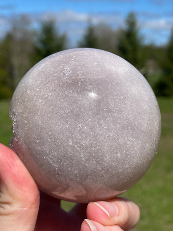 Pink Amethyst Sphere: Radiant crystal ball with delicate pink tones