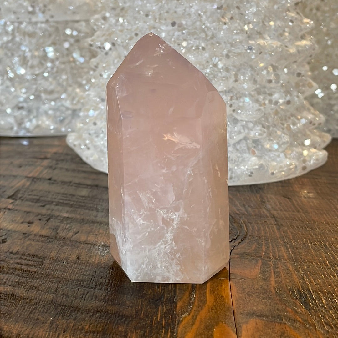 Elegant Rose Quartz tower, featuring soft pink tones and a graceful crystal formation for a serene and enchanting aesthetic