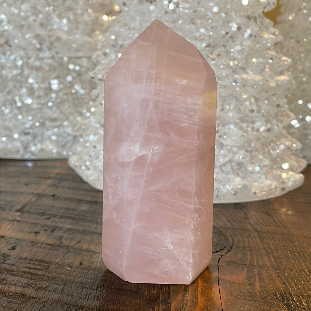 Elegant Rose Quartz tower, featuring soft pink tones and a graceful crystal formation for a serene and enchanting aesthetic
