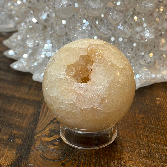 Pink Amethyst Druzy Sphere, a radiant and enchanting crystal ball showcasing delicate crystalline formations in soothing pink tones.