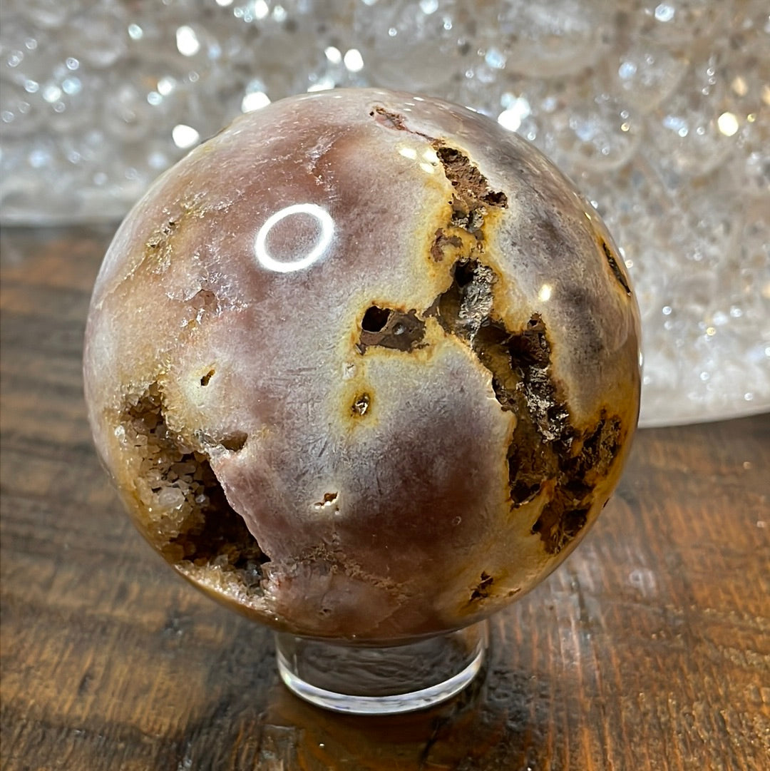 Pink Amethyst Druzy Sphere, a radiant and enchanting crystal ball showcasing delicate crystalline formations in soothing pink tones.
