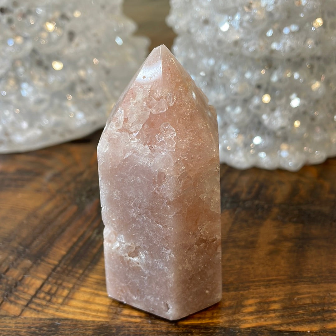 Pink Amethyst druzy tower, showcasing delicate crystalline formations in a soothing hue for a truly enchanting natural beauty.