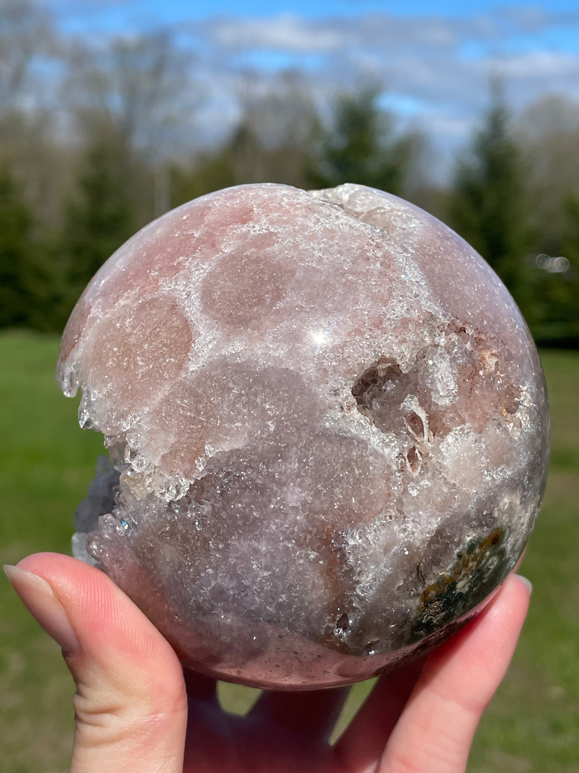 Pink Amethyst Sphere: Radiant crystal ball with delicate pink tones