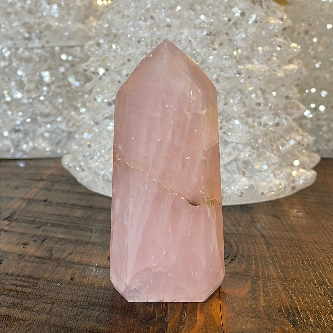 Elegant Rose Quartz tower, featuring soft pink tones and a graceful crystal formation for a serene and enchanting aesthetic