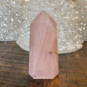 Elegant Rose Quartz tower, featuring soft pink tones and a graceful crystal formation for a serene and enchanting aesthetic