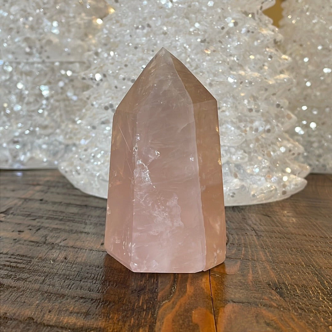 Elegant Rose Quartz tower, featuring soft pink tones and a graceful crystal formation for a serene and enchanting aesthetic