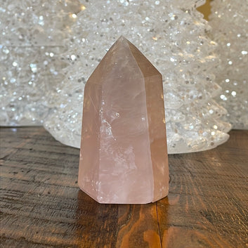 Elegant Rose Quartz tower, featuring soft pink tones and a graceful crystal formation for a serene and enchanting aesthetic