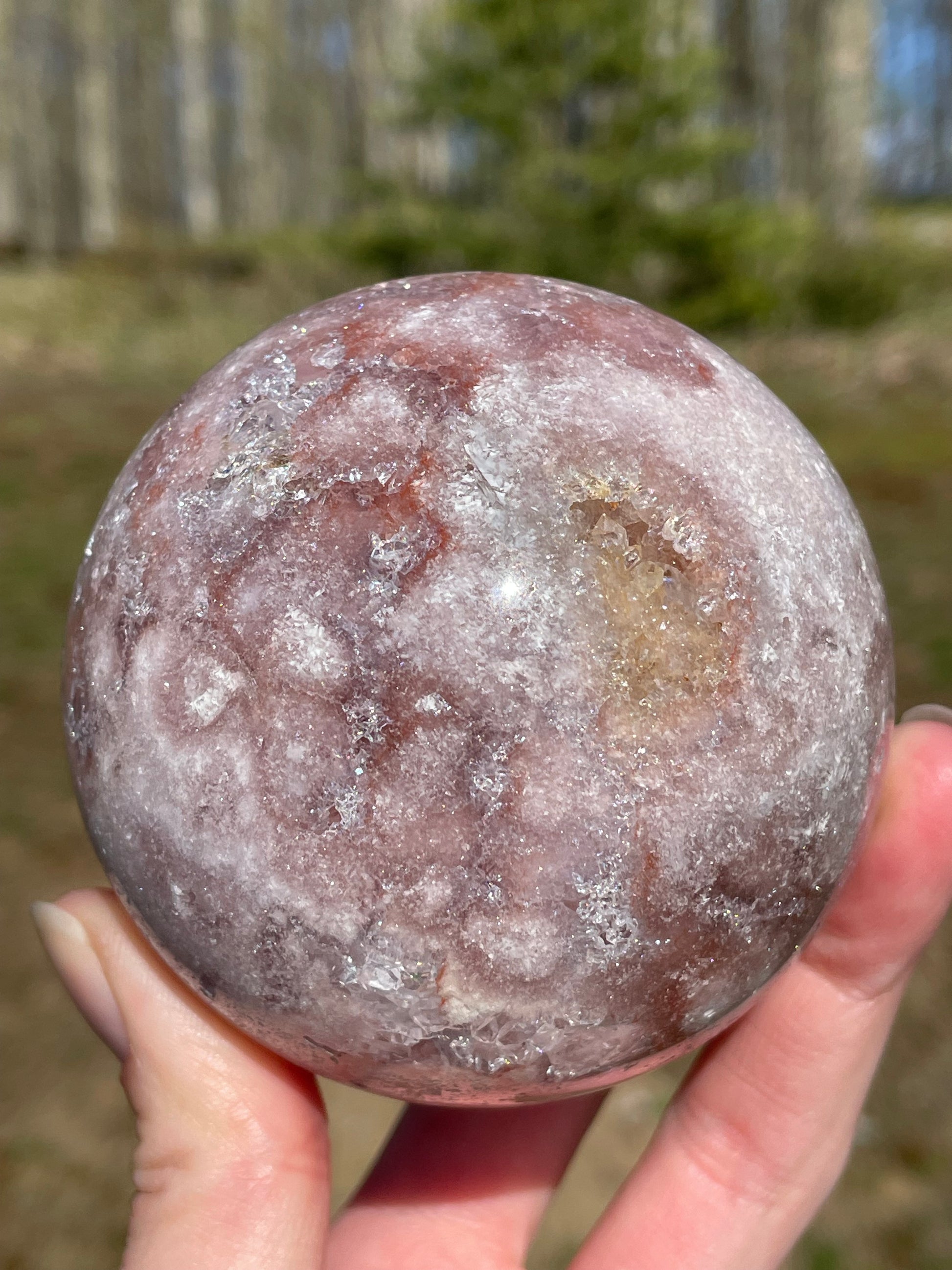Pink Amethyst Sphere: Radiant crystal ball with delicate pink tones