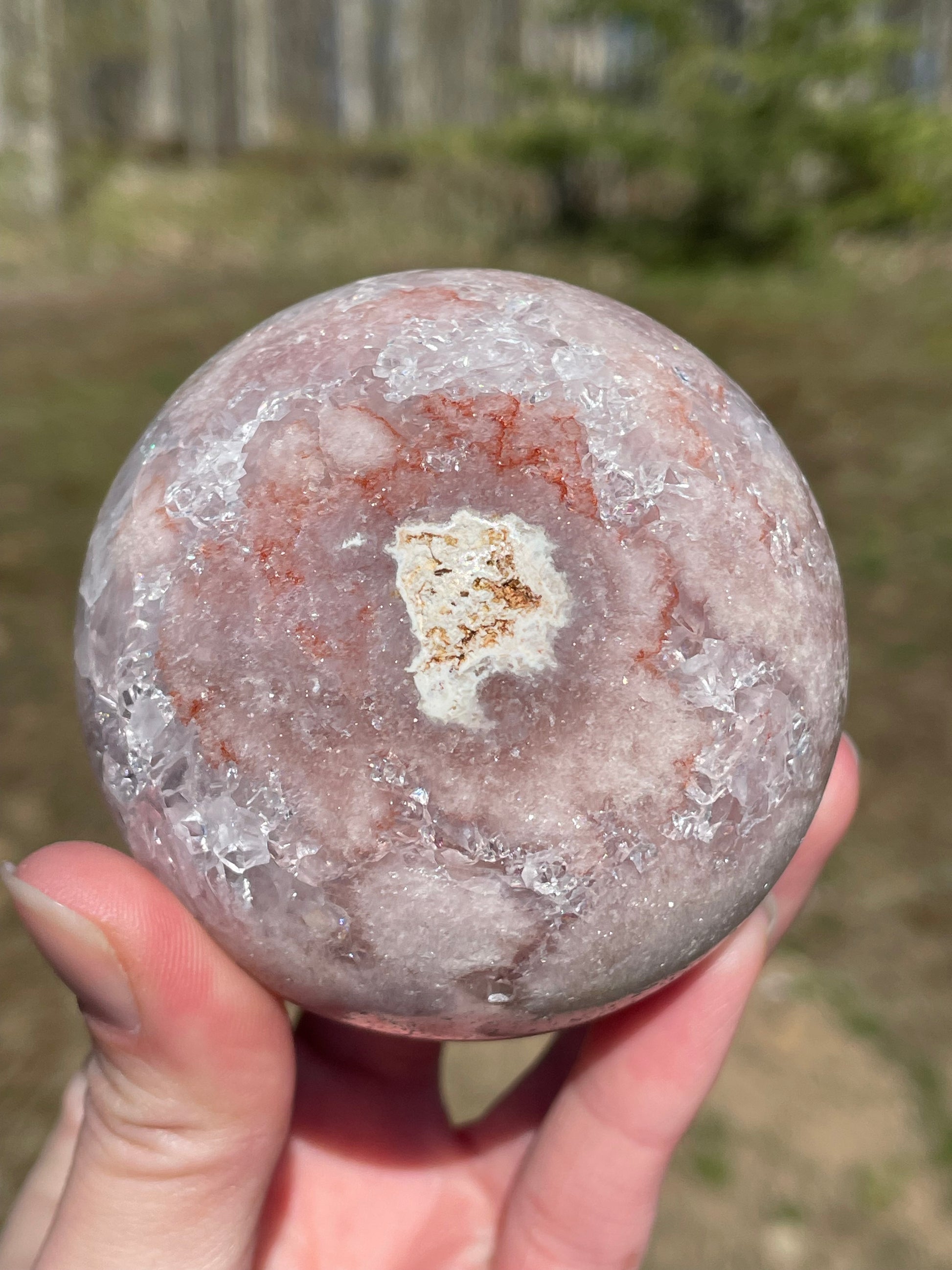 Pink Amethyst Sphere: Radiant crystal ball with delicate pink tones