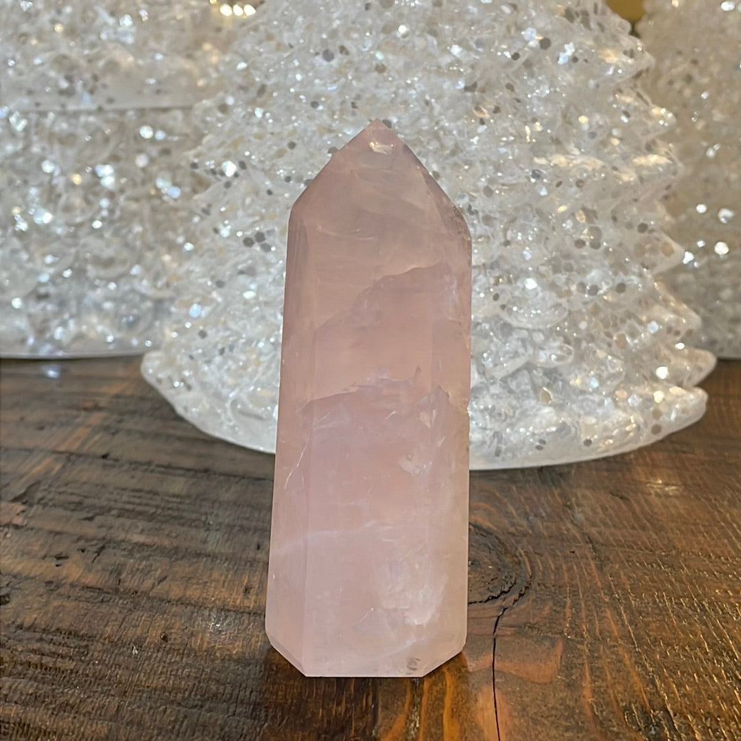 Elegant Rose Quartz tower, featuring soft pink tones and a graceful crystal formation for a serene and enchanting aesthetic
