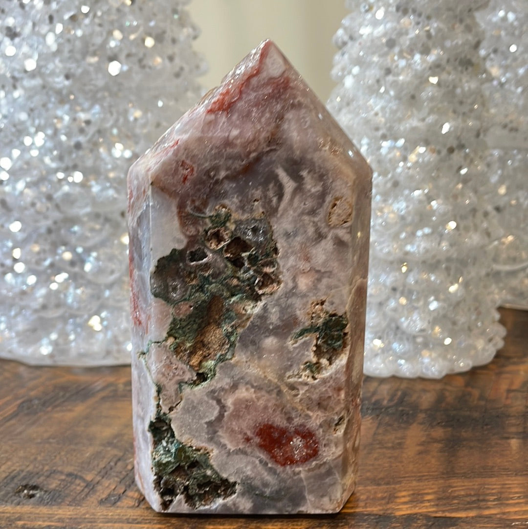 Pink Amethyst druzy tower, showcasing delicate crystalline formations in a soothing hue for a truly enchanting natural beauty.